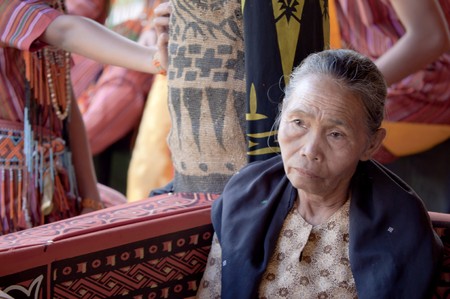Toraja old woman sadness during a funeral ceremony in indonesia village on 15th August 2010のeditorial素材