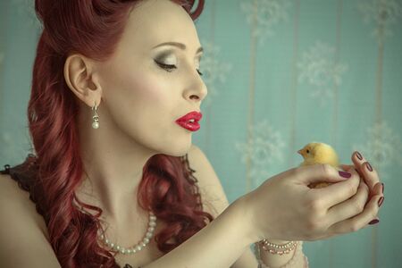 Pin-up girl in vintage room. American styleの写真素材