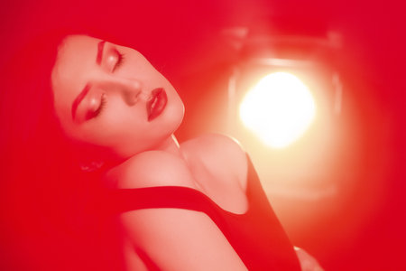 single beautiful woman asian girl red lightの写真素材