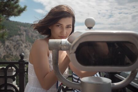 Girl tourist looks at the city (Crimea)の写真素材