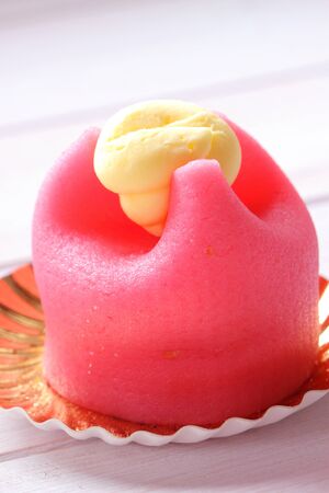 Marzipan covered cup cake with creamの写真素材