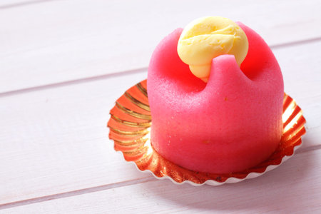 Marzipan covered cup cake with creamの写真素材