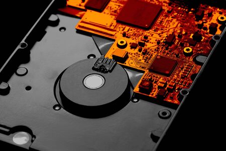 Circuit board on an internal computer hard disc drive with selective colorの写真素材