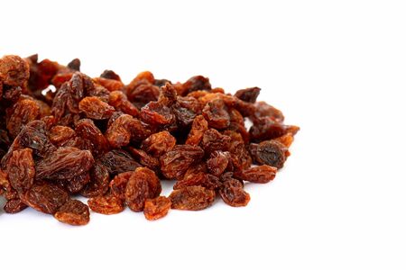 Pile of sultanas isolated on white backgroundの写真素材
