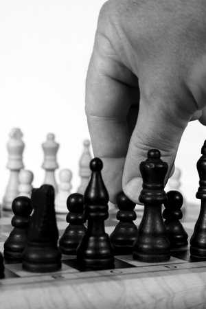 Man making a move in a chess matchの写真素材