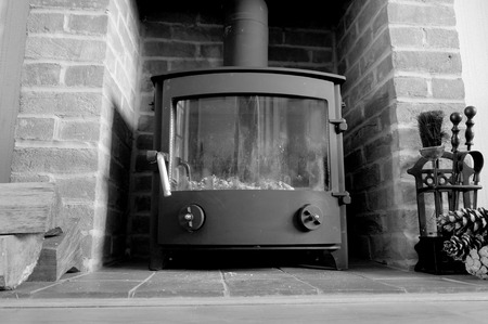 Brick fireplace with log burner.の写真素材