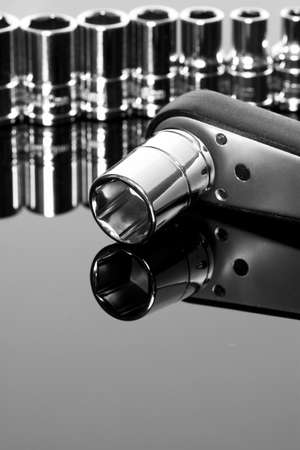 Socket set reflected on a shiny surfaceの写真素材