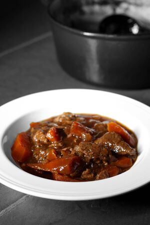 Abstract image of beef casserole in a bowl.の写真素材