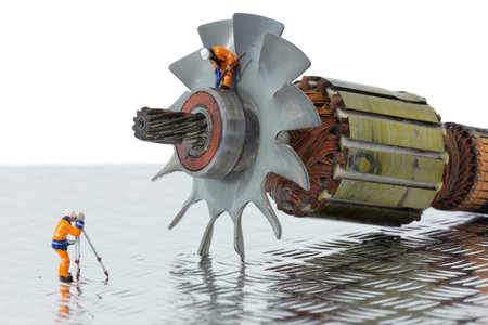 Miniature scale model construction workers with an industrial electric fan motor.  Checker steel...