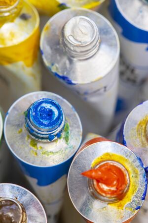 Close-up of an artists oil paint tubes open and used.  Art and craft supplies conceptの写真素材