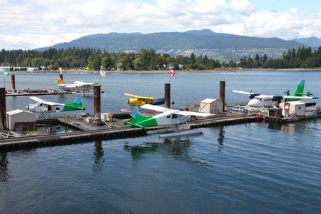 Sightseeing seaplanes in Vancouver BC harbor ready for tourist flights.