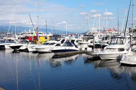 Yachts & sailboats moored in a marina in Vancouver BC. Canada.のeditorial素材
