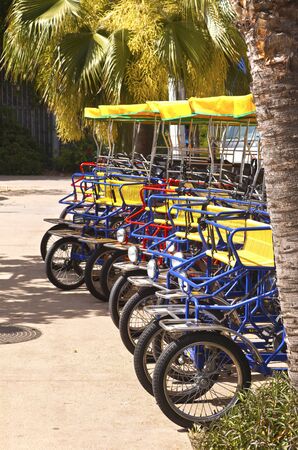 Tricycles for rent Balboa Park San Diego California の写真素材