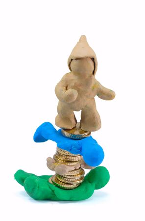 Colored plasticine puppet and moneyの写真素材