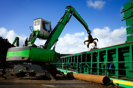 crane grabber loading a recycling metal