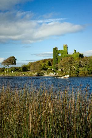 castle remains on the bank of the riverの写真素材