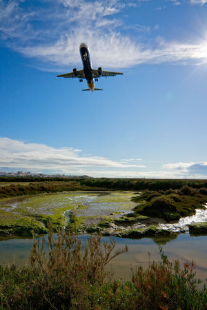 an airplane Against the skyの写真素材