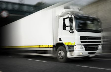 white refrigerator Truck  in motion の写真素材