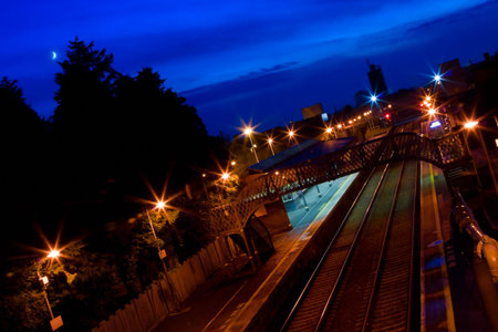 railway trek in Athenry train station at night and new moonの写真素材