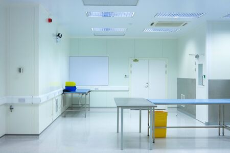 clean room with tables in medical packaging plant interiorの写真素材