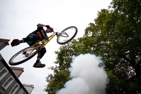 GALWAY - JUNE 19: Bmx biker performing in the Galway Bike Festival on June 19, 2011 in Galway, Ireland.のeditorial素材