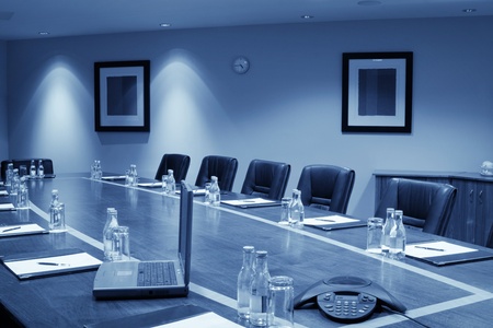 conference hall Interior with table, raw of chairs and blocknotesの写真素材