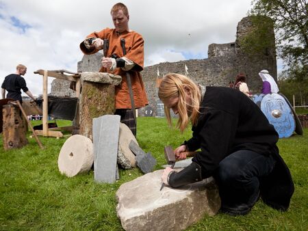 ATHENRY, IRELAND - AUGUST 21: People from Eireann Edge displays workshops at annual National Walled Towns Day  on August 21, 2011 in Athenry, Ireland.のeditorial素材