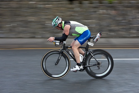 GALWAY - SEPTEMBER 4: Alan Bingham (1587) compete at first Edition of Galway Iron Man Triathlon on September 4, 2011 in Galway, Irelandのeditorial素材