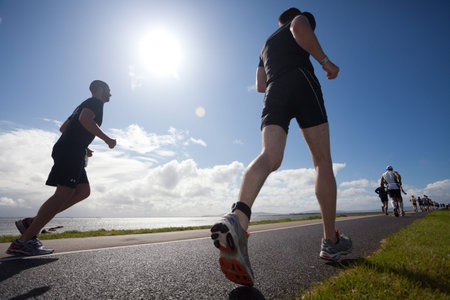 GALWAY, IRELAND - SEPT 4: Unidentified athletes compete at first Edition of Galway Iron Man Triathlon on September 4, 2011 in Galway, Irelandのeditorial素材