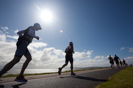 GALWAY, IRELAND - SEPT 4: Unidentified athletes compete at first Edition of Galway Iron Man Triathlon on September 4, 2011 in Galway, Irelandのeditorial素材