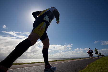 GALWAY, IRELAND - SEPT 4: Unidentified athletes compete at first Edition of Galway Iron Man Triathlon on September 4, 2011 in Galway, Irelandのeditorial素材