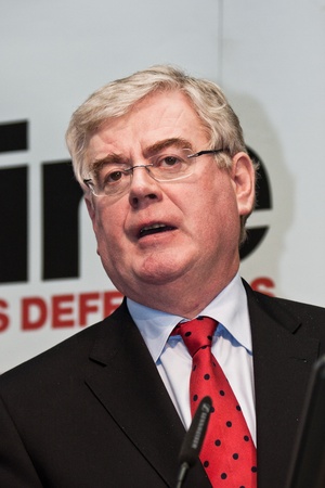 DUBLIN, IRELAND - SEPT 16: Eamon Gilmore, Minister for Foreign Affairs and Trade, speaking at Dublin Castle for the Sixth Front Line Dublin Platform for Human Rights Defenders,  September 16, 2011 in Dublin, Irelandのeditorial素材