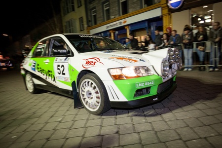 GALWAY - FEBRUARY 4: L. Higgins with Mitsubishi EVO 7 take part at Cremonial start of annual Galway International Rally on February 4, 2012 in Galway, Ireland.のeditorial素材