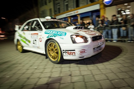 GALWAY - FEBRUARY 4:J.Folan with Subaru Impreza N10 take part at Cremonial start of annual Galway International Rally on February 4, 2012 in Galway, Ireland.のeditorial素材