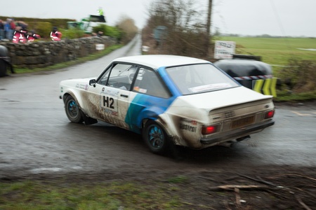GALWAY - FEBRUARY 5:E.Graham driving Ford escort RS at annual Galway International Rally on February 5, 2012 in Galway, Ireland.のeditorial素材