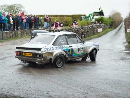 GALWAY - FEBRUARY 5:G.Machale driving Ford Focus at annual Galway International Rally on February 5, 2012 in Galway, Ireland.のeditorial素材