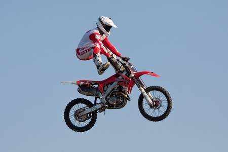 GALWAY, IRELAND - MAY 26: Dave Wiggins freestyle motocross rider jumps through the air during The  Extreme Stunt Show on May 26, 2012 in Galway, Irelandのeditorial素材