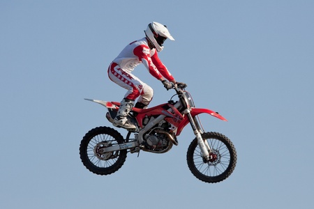 GALWAY, IRELAND - MAY 26: Dave Wiggins freestyle motocross rider jumps through the air during The  Extreme Stunt Show on May 26, 2012 in Galway, Irelandのeditorial素材