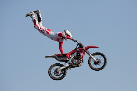 GALWAY, IRELAND - MAY 26: Dave Wiggins freestyle motocross rider jumps through the air during The  Extreme Stunt Show on May 26, 2012 in Galway, Irelandのeditorial素材