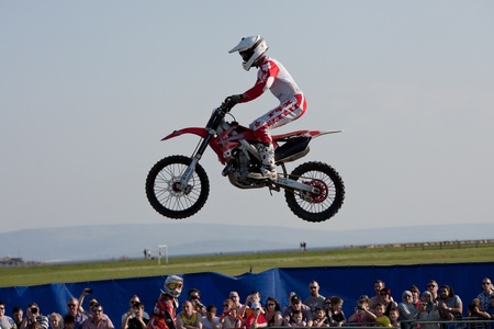 GALWAY, IRELAND - MAY 26: Dave Wiggins freestyle motocross rider jumps through the air during The  Extreme Stunt Show on May 26, 2012 in Galway, Irelandのeditorial素材