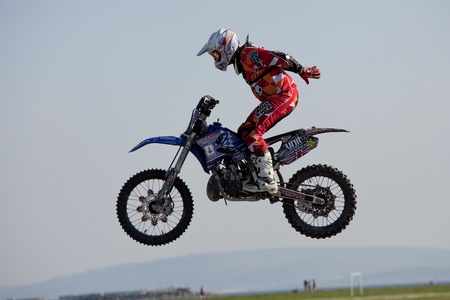 GALWAY, IRELAND - MAY 26:  Josh Grindrod freestyle motocross rider jumps through the air during The  Extreme Stunt Show on May 26, 2012 in Galway, Irelandのeditorial素材