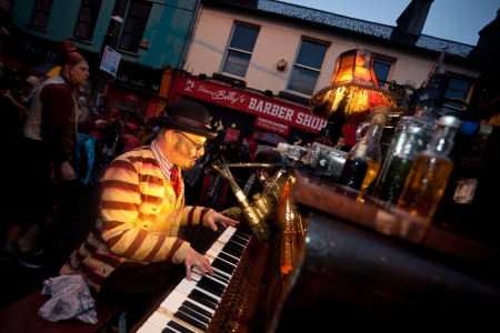 GALWAY, IRELAND - JULY 22: Macnas street performance This Thunderous Heart, during Galway Arts Festival 2012, on July 22, 2012 in Galway, Ireland.のeditorial素材