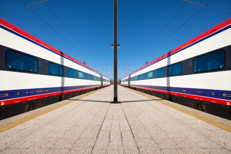 High-speed modern intercity trains at station, abstractのeditorial素材