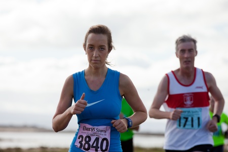 GALWAY, IRELAND - OCTOBER 6: Edel Haverty and other athletes compete during annual Galway Bay Half Marathon and 10K, on October 6, 2012 in Galway, Ireland.のeditorial素材