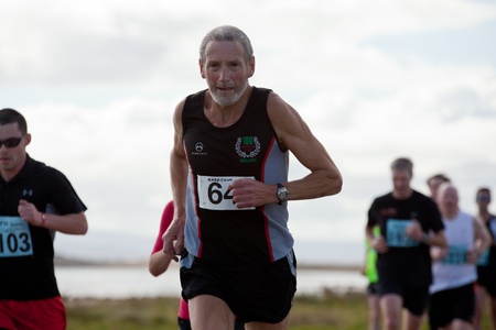 GALWAY, IRELAND - OCTOBER 6: Unidentified athletes compete during annual Galway Bay Half Marathon and 10K, on October 6, 2012 in Galway, Ireland.のeditorial素材