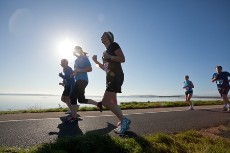 GALWAY, IRELAND - OCTOBER 6: Unidentified athletes compete during annual Galway Bay Half Marathon and 10K, on October 6, 2012 in Galway, Ireland.のeditorial素材