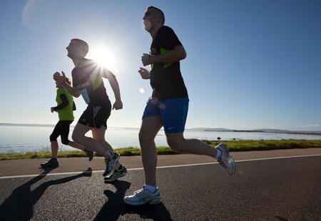 GALWAY, IRELAND - OCTOBER 6: Unidentified athletes compete during annual Galway Bay Half Marathon and 10K, on October 6, 2012 in Galway, Ireland.のeditorial素材