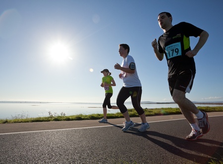 GALWAY, IRELAND - OCTOBER 6: Enda Bourke (179) and other athletes compete during annual Galway Bay Half Marathon and 10K, on October 6, 2012 in Galway, Ireland.のeditorial素材