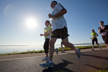 GALWAY, IRELAND - OCTOBER 6: Unidentified athletes compete during annual Galway Bay Half Marathon and 10K, on October 6, 2012 in Galway, Ireland.のeditorial素材