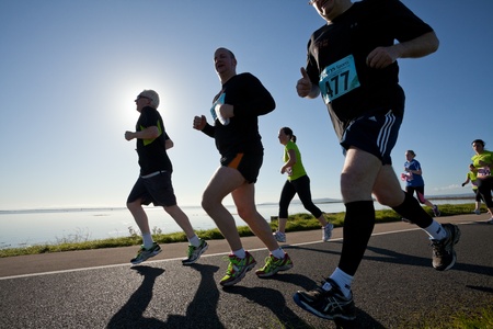 GALWAY, IRELAND - OCTOBER 6: Unidentified athletes compete during annual Galway Bay Half Marathon and 10K, on October 6, 2012 in Galway, Ireland.のeditorial素材